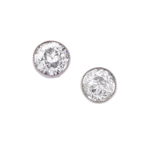 Pair of early 20th century diamond collet stud earrings, c.1910, each old round brilliant cut diamonds of approximately 1.80cts total,